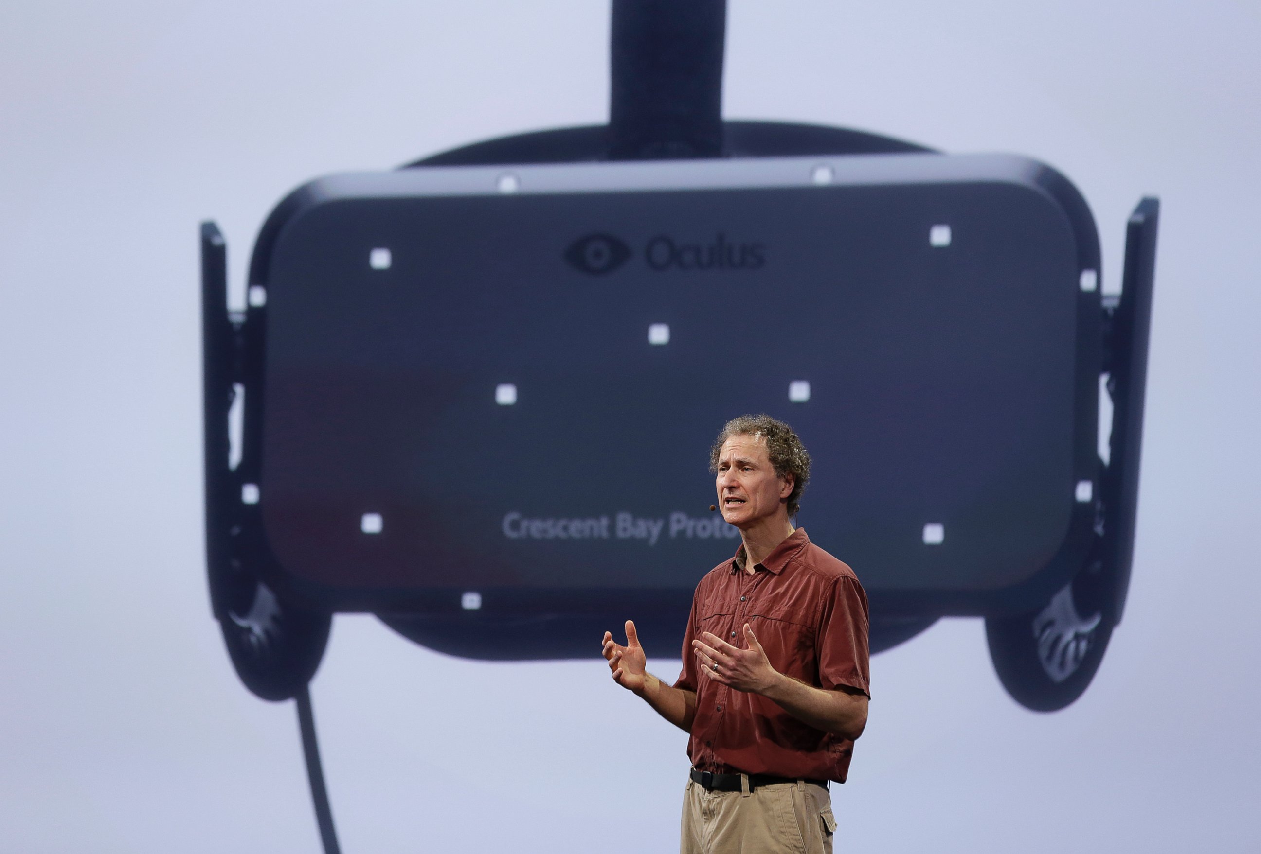 PHOTO: Michael Abrash, chief scientist for Oculus, talks about virtual reality during a keynote address at the Facebook F8 Developers Conference Thursday, March 26, 2015, in San Francisco.