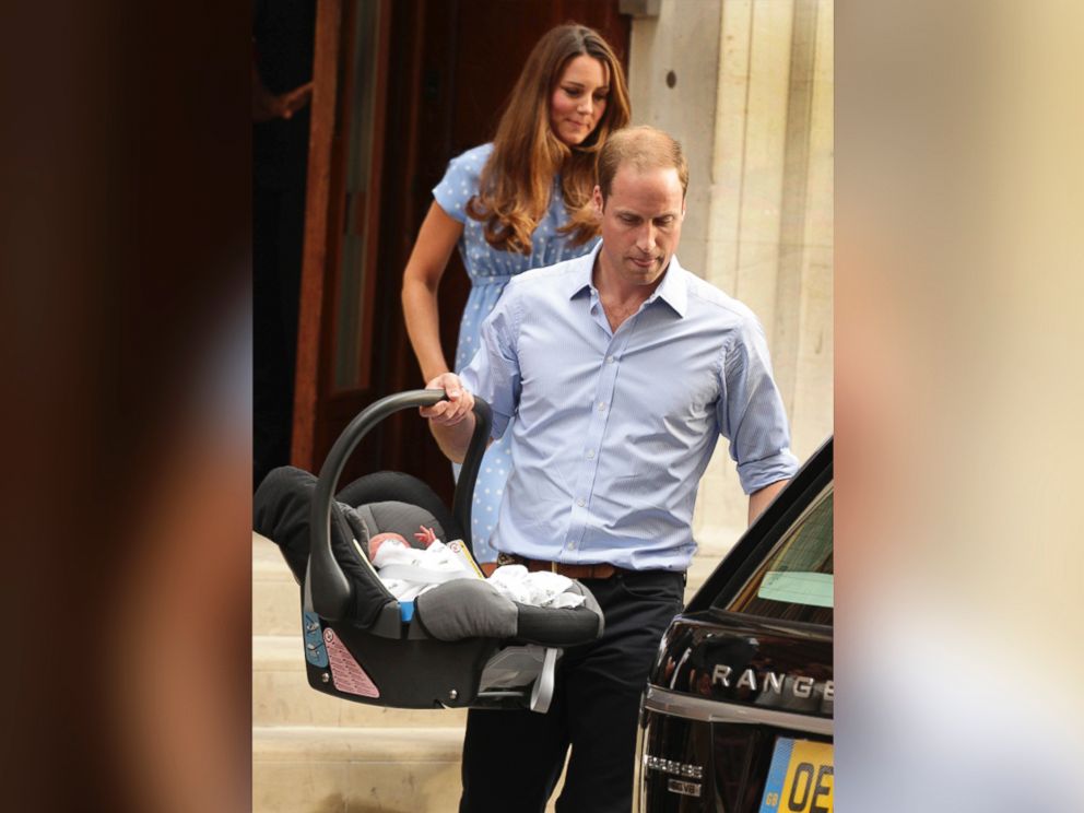 PHOTO: The Duke and Duchess of Cambridge leave the Lindo Wing of St Mary's Hospital in London Tuesday July 23 2013, carrying their new-born son.