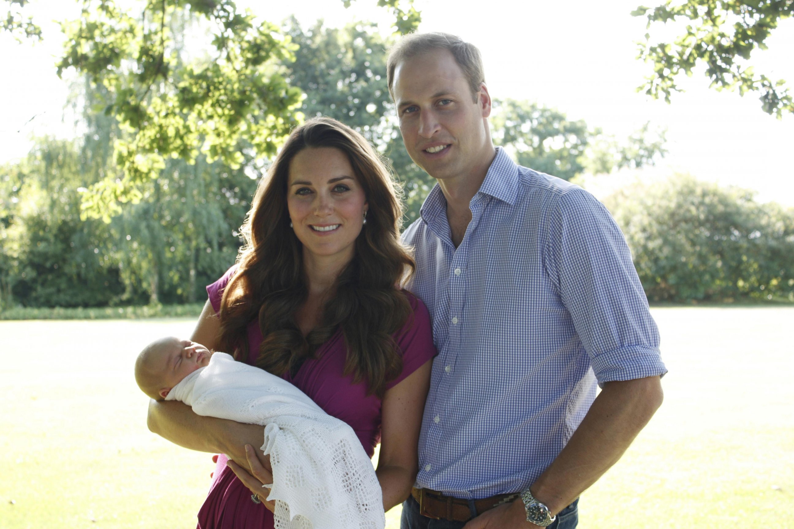 PHOTO: The Duke and Duchess of Cambridge 2013. This Seraphine pink fuchsia maternity dress sold out after this photo was released. 