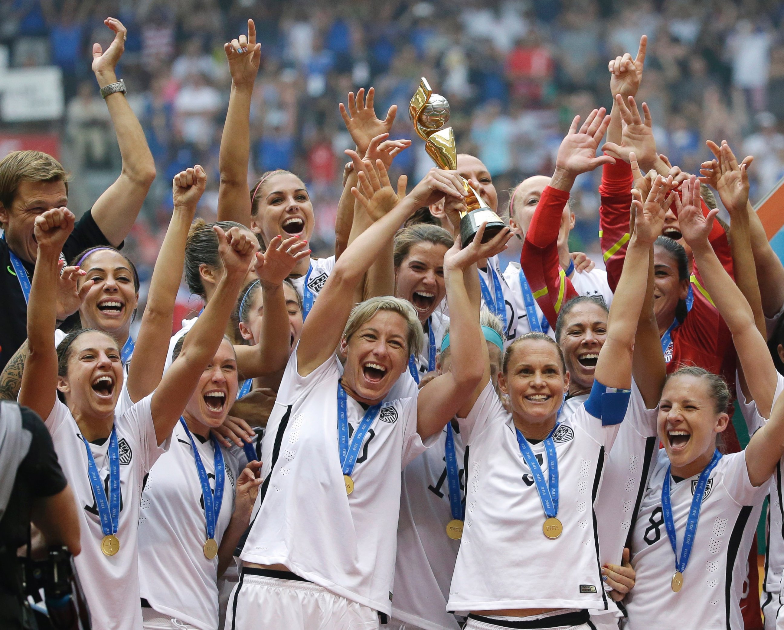 PHOTO: The United States Women's National Team celebrates with the trophy after they beat Japan in the FIFA Women's World Cup soccer championship in Vancouver, Canada, July 5, 2015. 