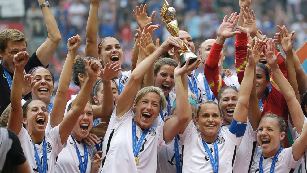 The United States Women's National Team celebrates with the trophy after they beat Japan in the FIFA Women's World Cup soccer championship in Vancouver, Canada, July 5, 2015. 