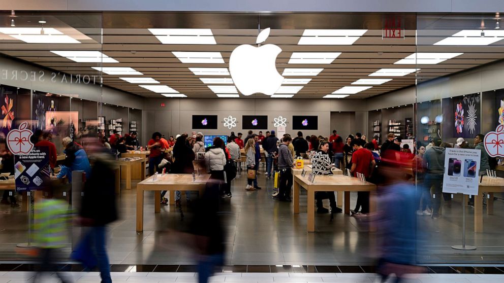 PHOTO: Shoppers walk past the Apple store at the King of Prussia Mall, Dec. 11, 2022, in King of Prussia, Pa.
