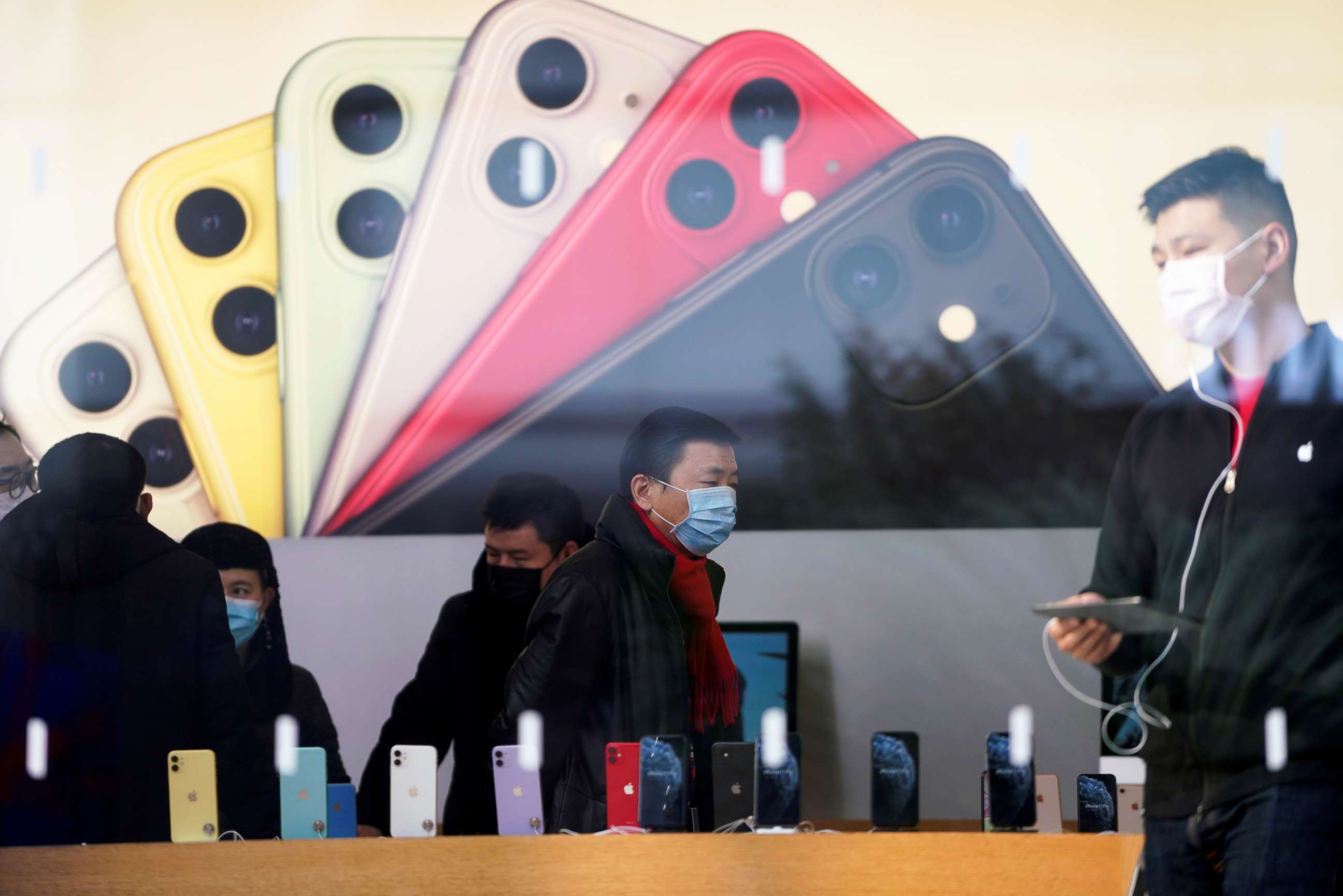 PHOTO: People wearing protective masks are seen in an Apple Store, as China is hit by an outbreak of the new coronavirus, in Shanghai, Jan. 29, 2020.