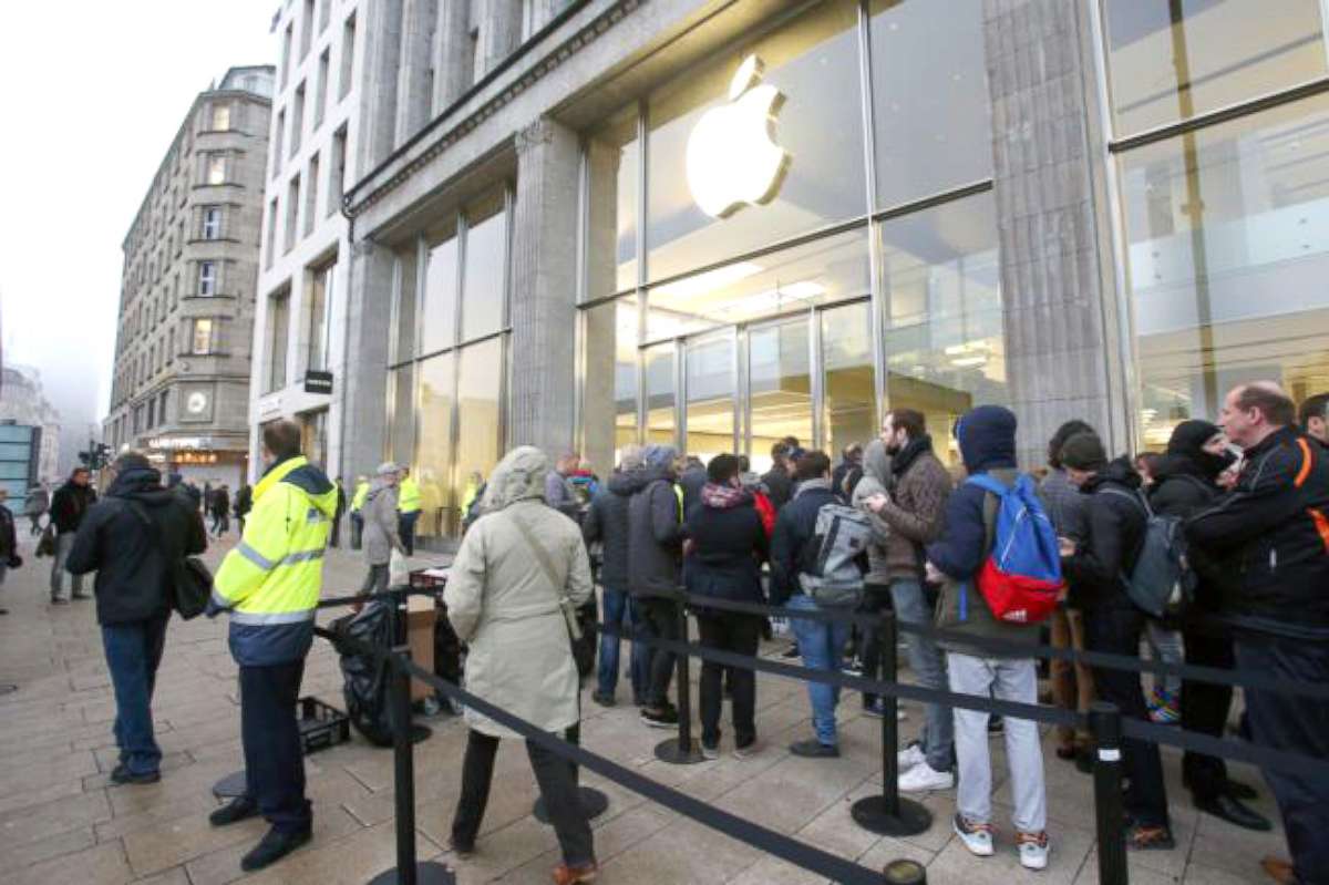 PHOTO: People can be seen at an Apple Store, waiting to purchase the new iPhone X in Hamburg, Germany, Nov. 3, 2017. 