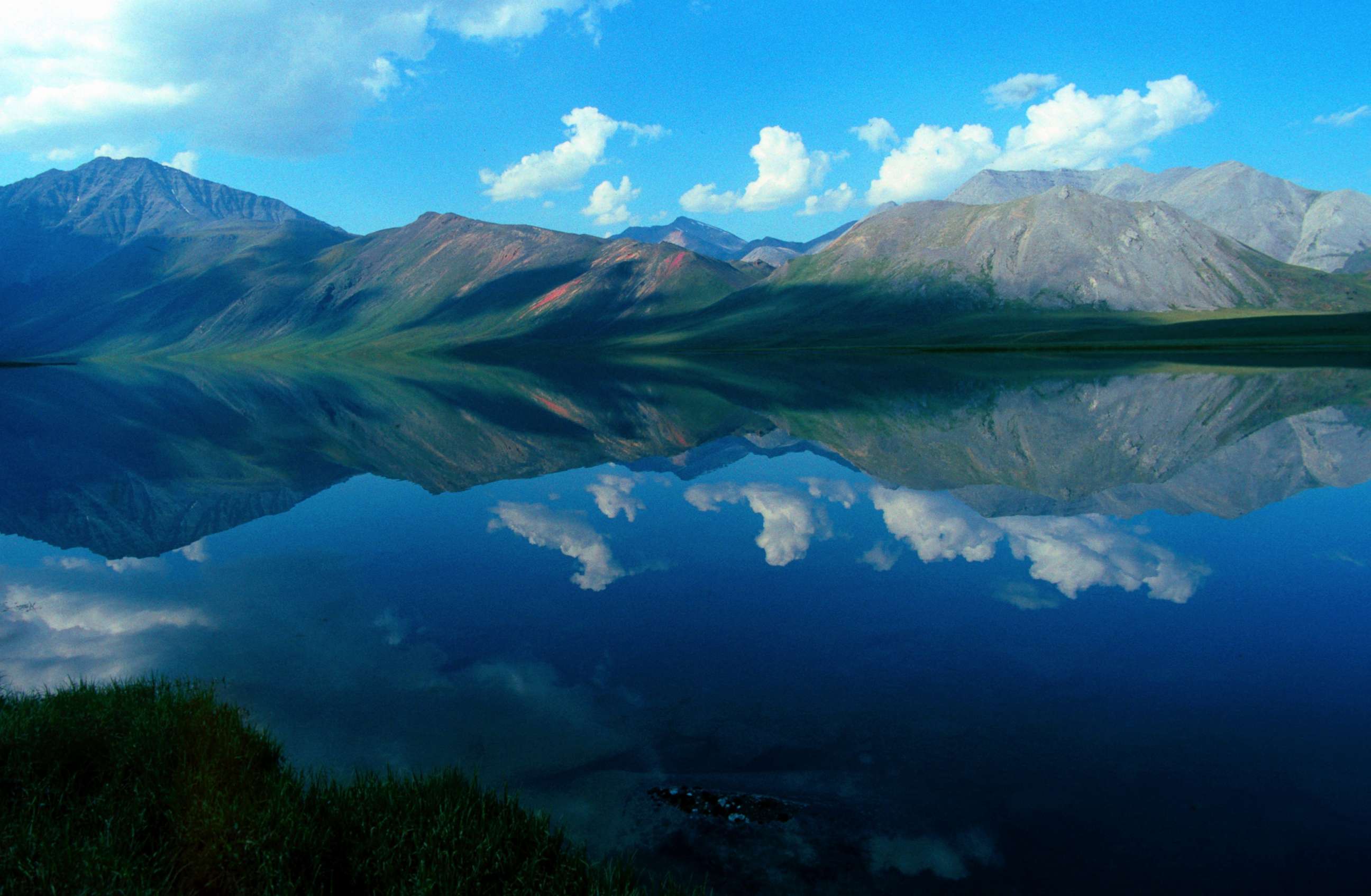 PHOTO: Part of the Brooks Range mountain range is reflected in Schrader Lake in the Arctic National Wildlife Refuge in Alaska, Feb. 1, 2013.
