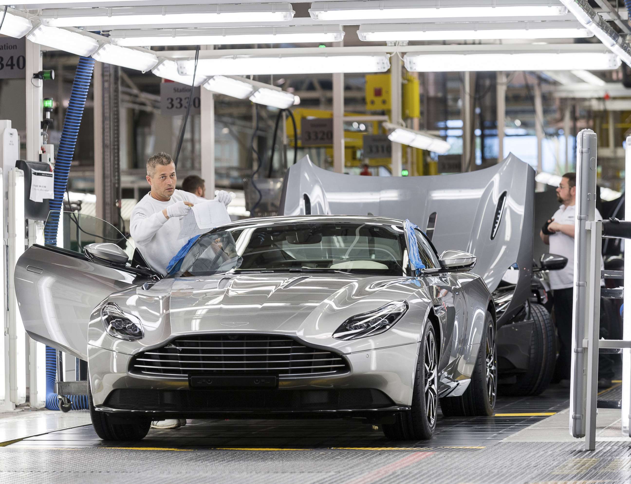 PHOTO: It takes 50 hours to paint each Aston Martin vehicle.