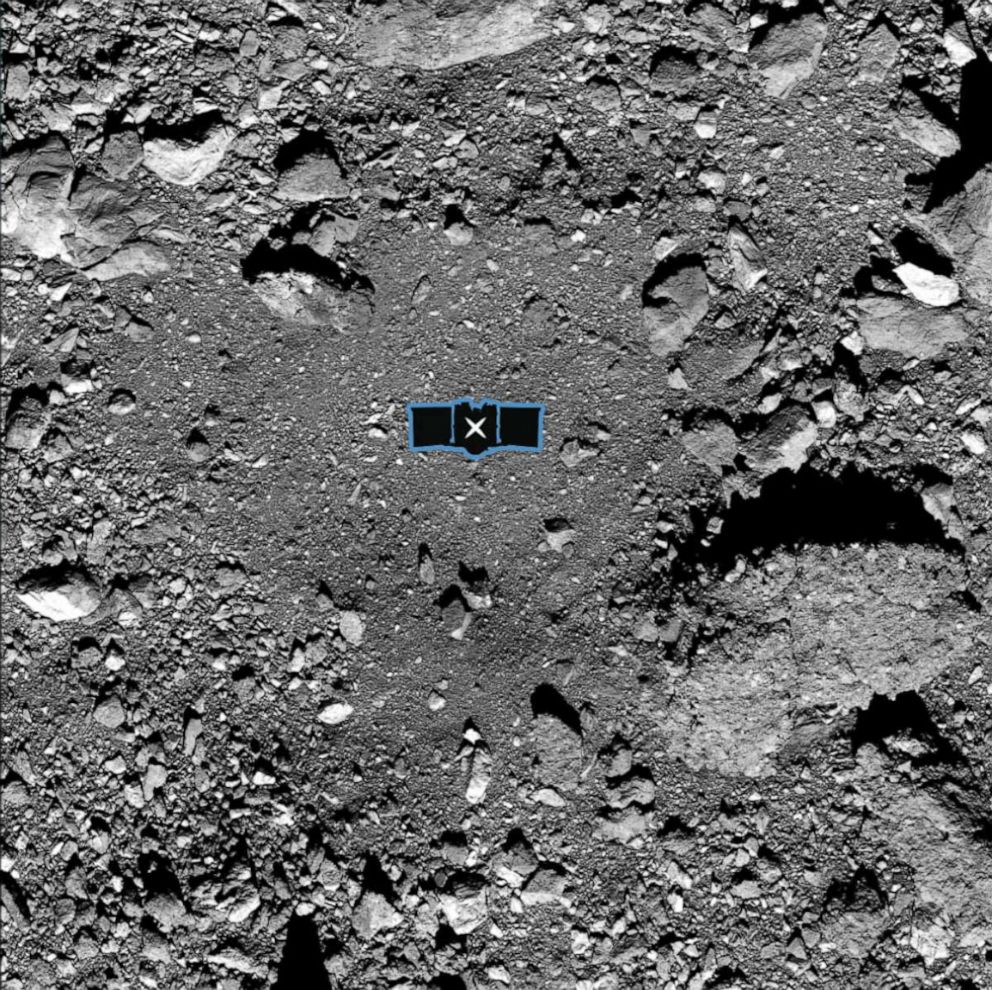 PHOTO: This undated photo shows the OSIRIS-REx primary sample site, Nightingale. The center of the site is marked with an X, and a silhouette of the spacecraft is added for scale.