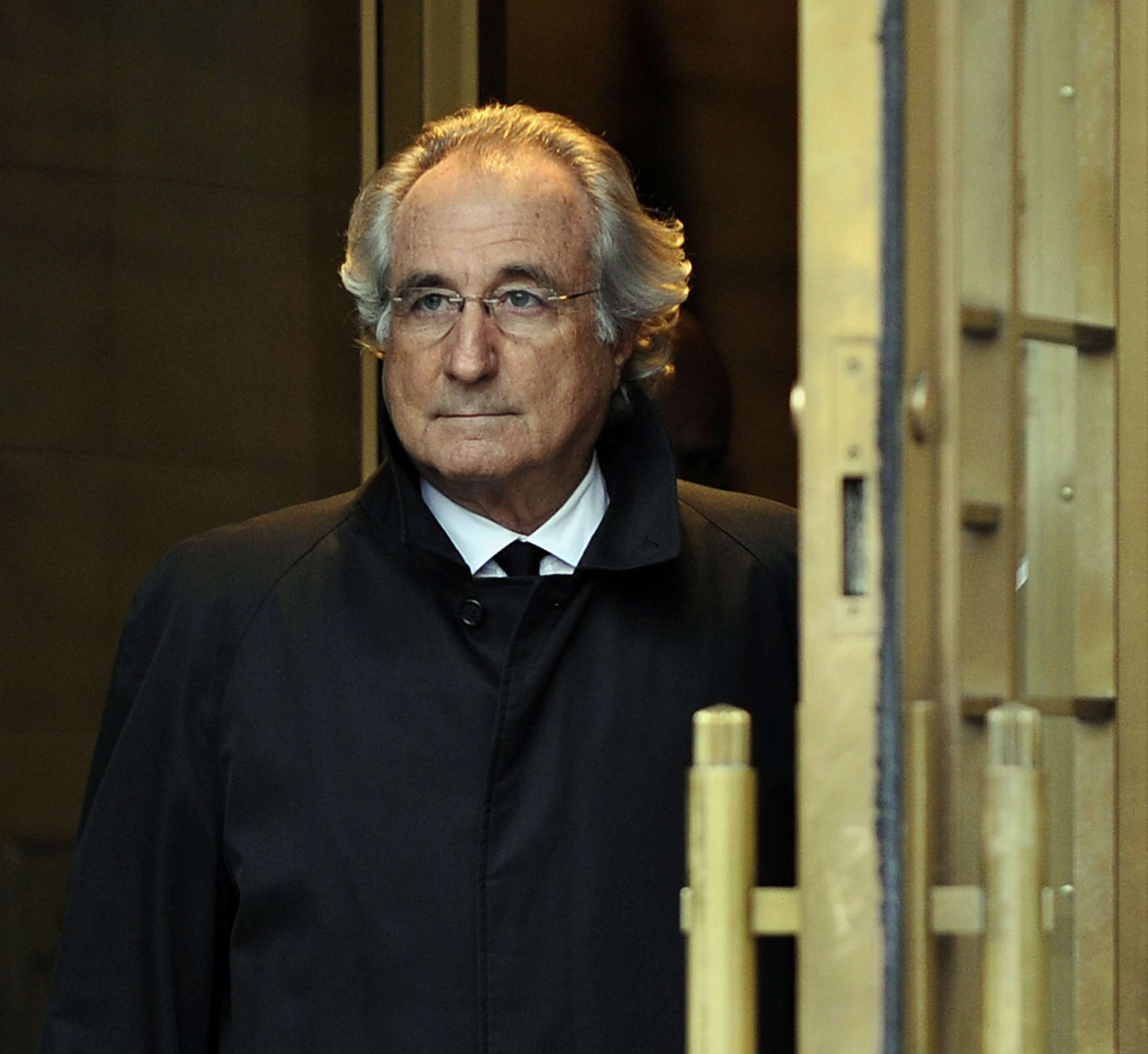 PHOTO: In this Jan. 14, 2009, file photo, Bernard Madoff leaves US Federal Court in New York after a hearing regarding his bail.