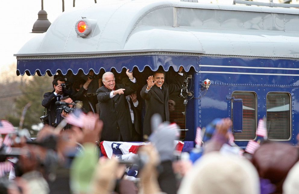 PHOTO: Vice President-elect Joe Biden and President-elect Barack Obama wave to supporters from the back of a train, Jan. 17, 2009, in Edgewood, Md., en route from Philadelphia to Washington D.C. for their inauguration.