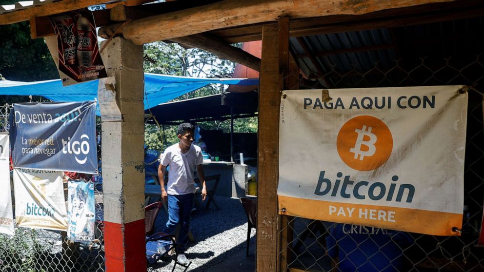 PHOTO: Bitcoin banners are seen outside of a small restaurant at El Zonte Beach in Chiltiupan, El Salvador, June 8, 2021.
