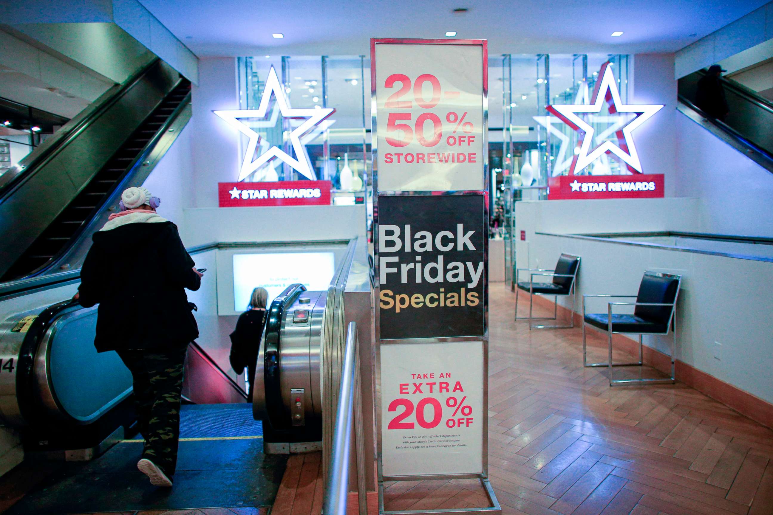 PHOTO: Customers shop at Macys department store in New York on Black Friday, November 27, 2020.