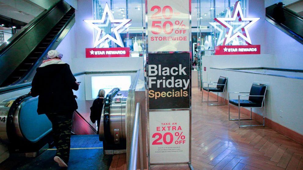 PHOTO: Customers shop at Macys department store in New York on Black Friday, November 27, 2020.