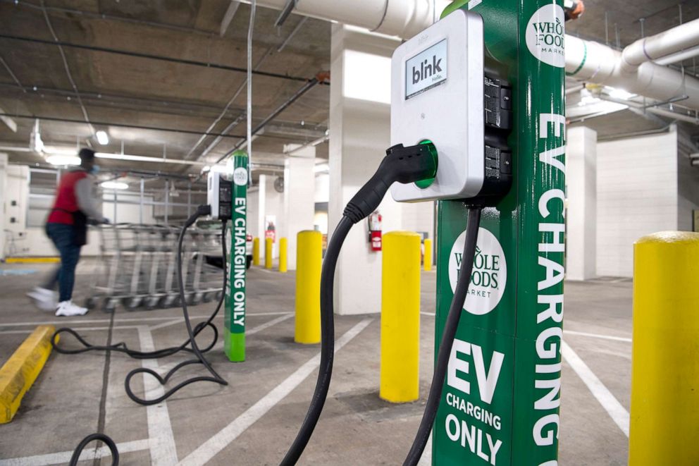 PHOTO: A Blink charging station is seen in a Whole Foods grocery store parking garage in Washington, D.C., March 31, 2021.