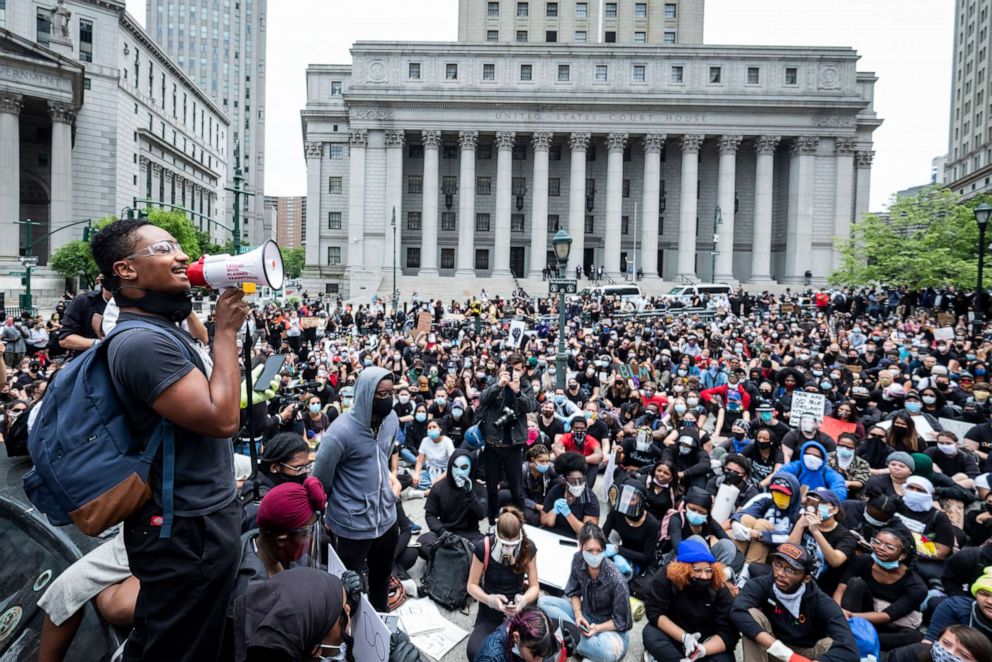 PHOTO: MANHATTAN, NY - JUNE 02: A massive group of protesters sit on the ground at Foley Square A massive group of protesters sit on the ground at Foley Square in a show of peaceful protest while they listen to a speaker, June 2, 2020, in New York.