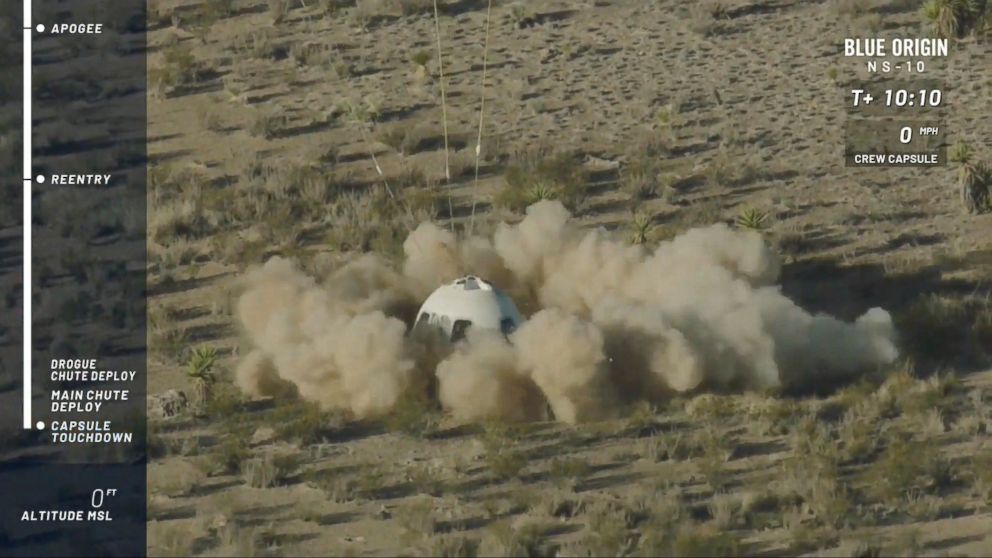 PHOTO: In this image from video made available by Blue Origin, the New Shepard capsule lands at the company's site in west Texas. Jeff Bezos' rocket company launched NASA experiments into space on the brief test flight. 