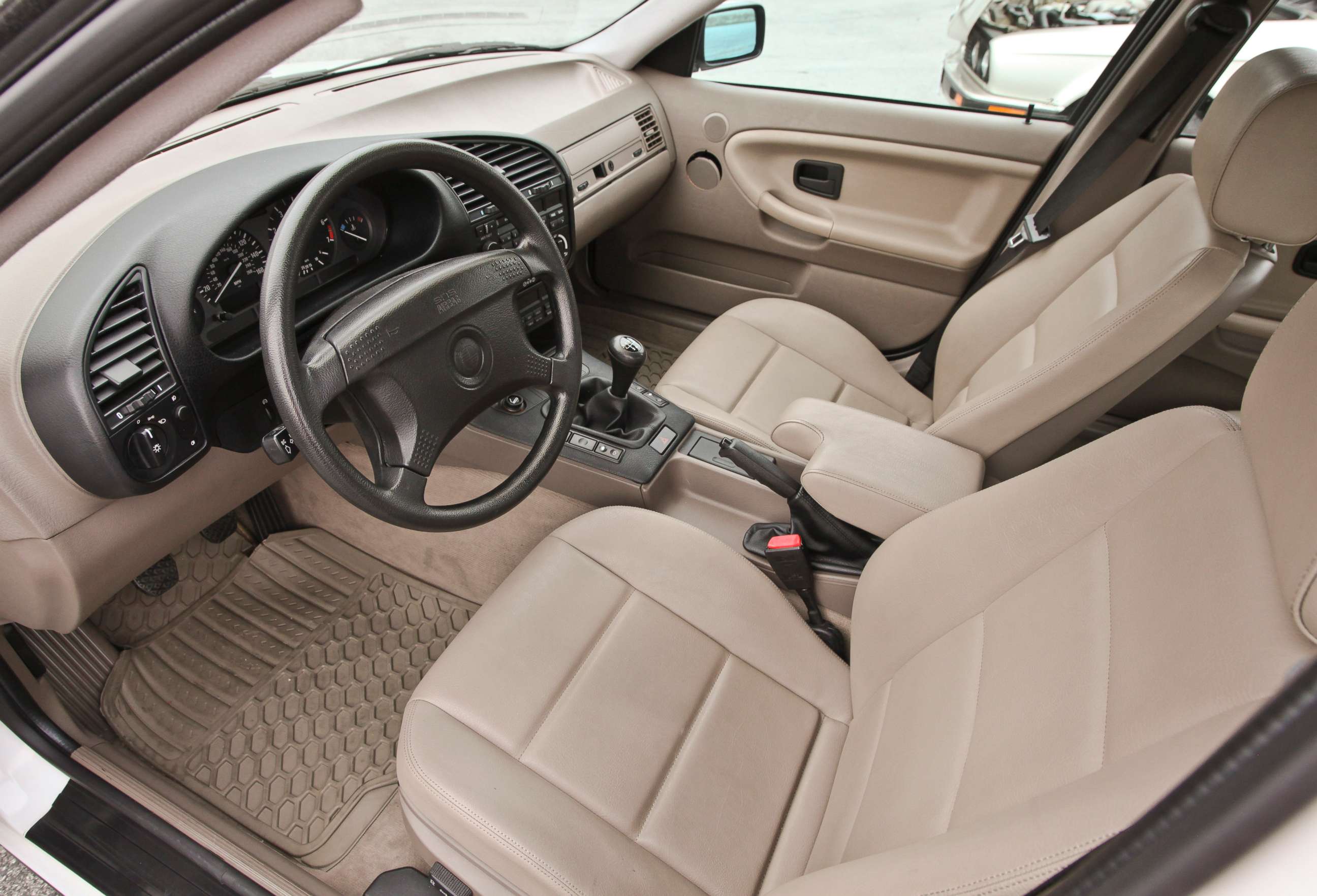 PHOTO: The interior of a 1995 BMW 3 series. The company previously called its non-animal leather "leatherette." 