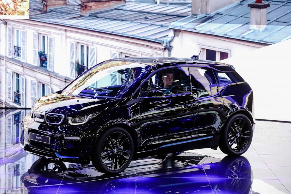 PHOTO: A BMW i3 compact electric automobile drives on stage during a news conference  during the Paris Motor Show in Paris, Oct. 2, 2018.