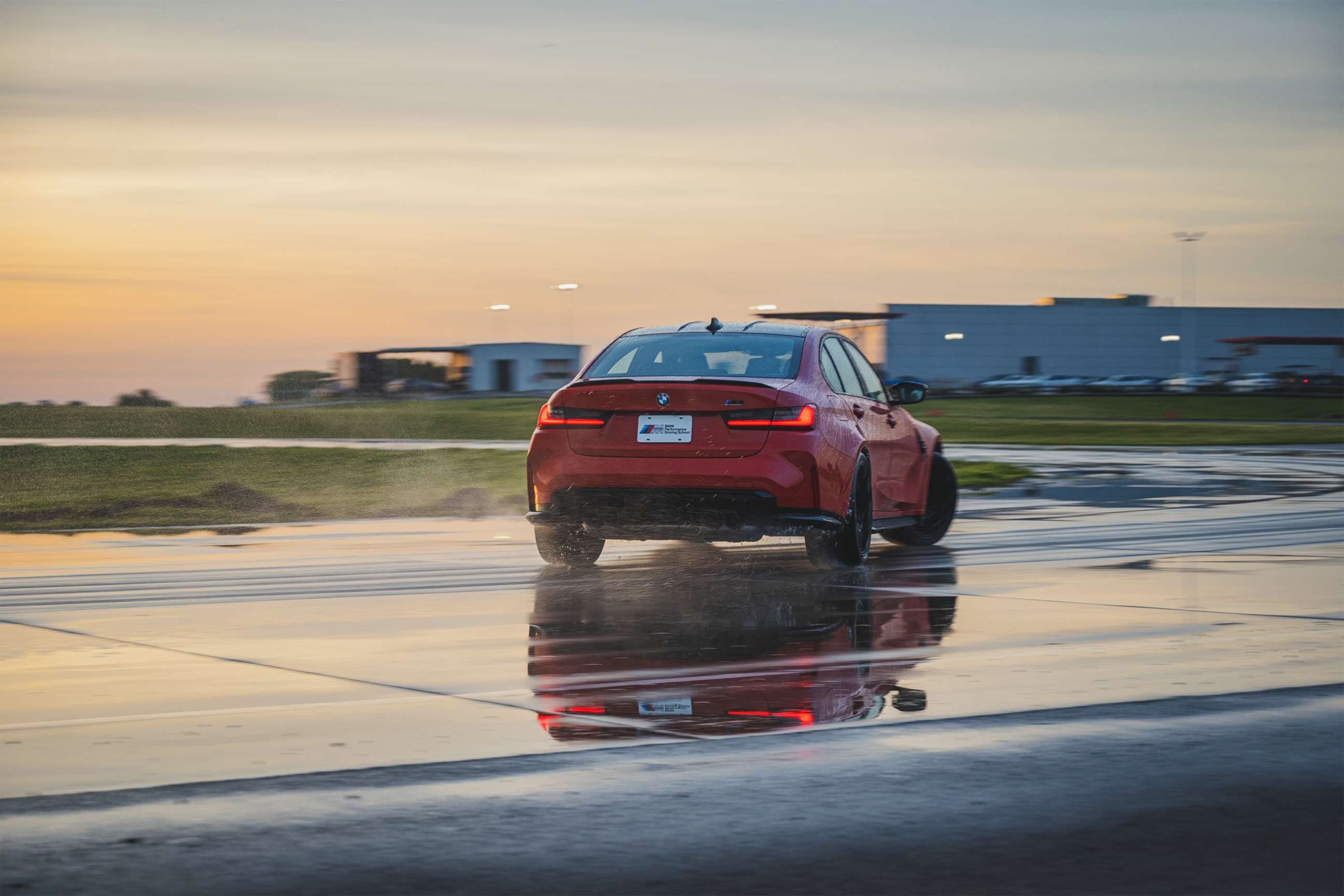 PHOTO: A driver tests an M3's handling on a wet skid pad at BMW's Driving School in South Carolina.