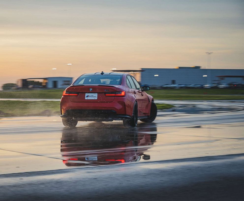 PHOTO: A driver tests an M3's handling on a wet skid pad at BMW's Driving School in South Carolina.