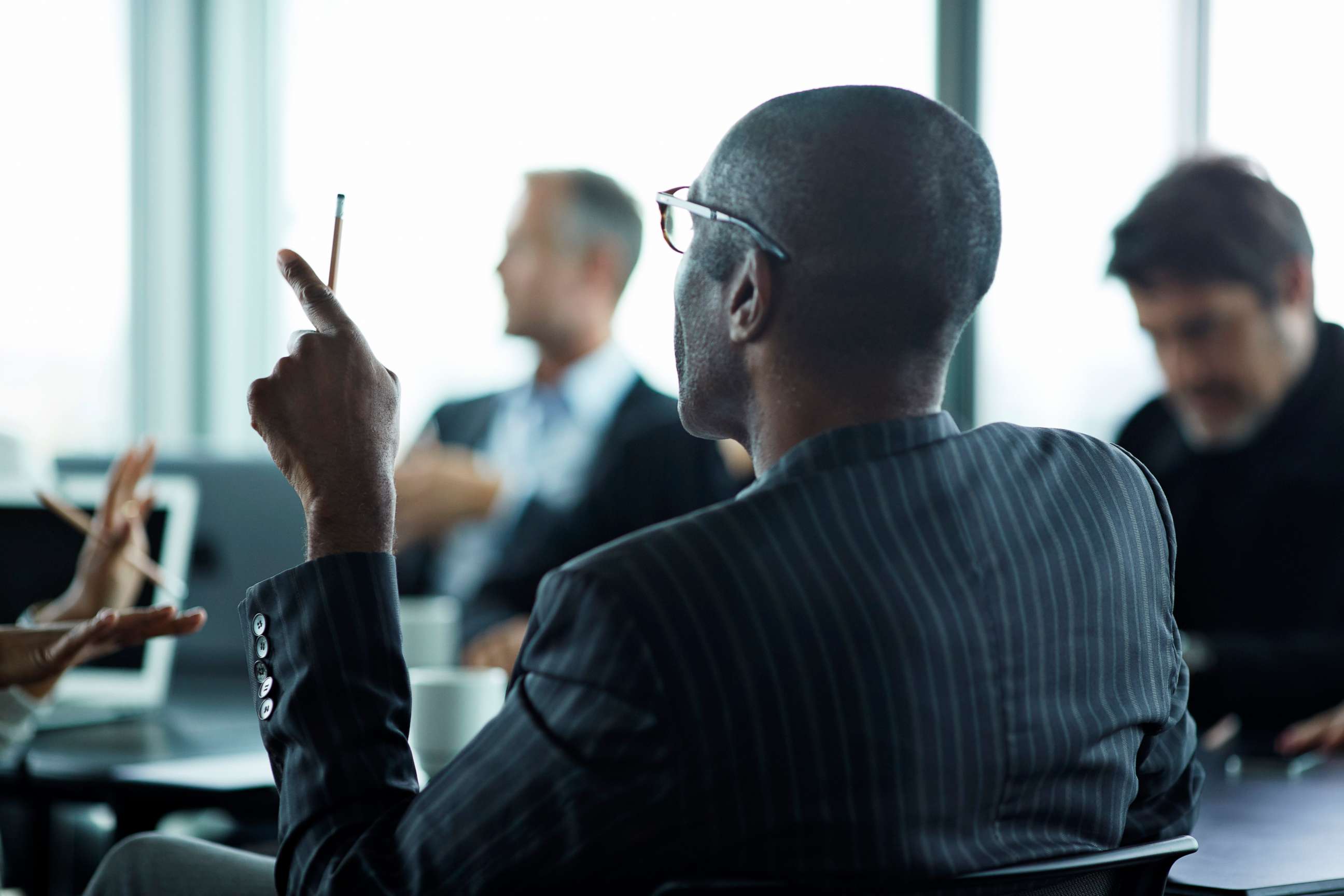 PHOTO: A meeting is held in a boardroom in this stock photo.