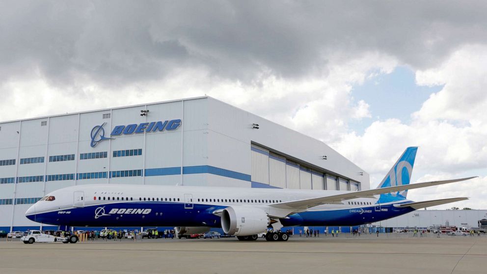 PHOTO: Boeing employees stand near the new Boeing 787-10 Dreamliner at the company's facility in South Carolina after conducting its first test flight at Charleston International Airport in North Charleston, S.C., March 31, 2017.