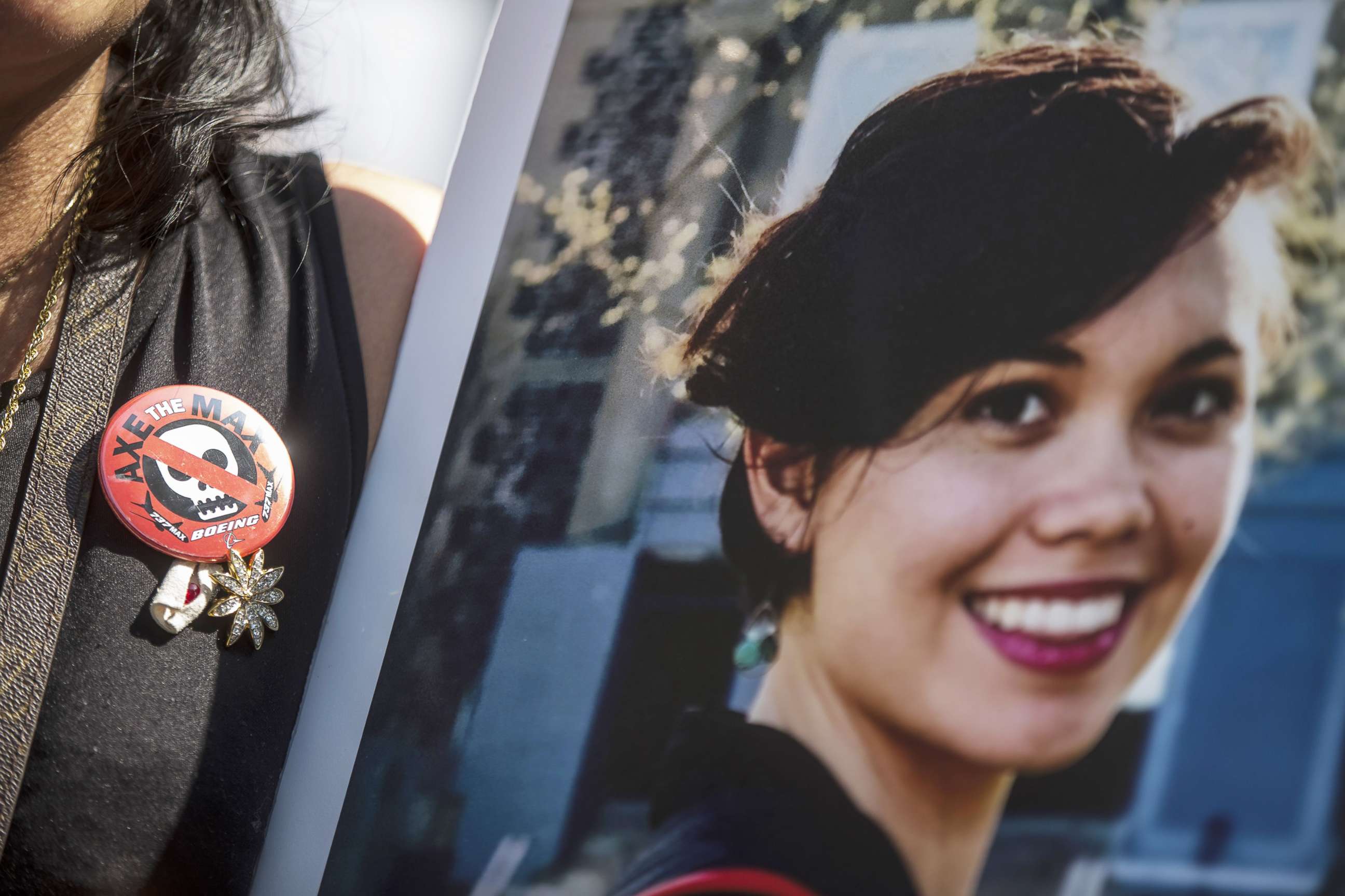 PHOTO: Clariss Moore wears a button calling for the Boeing 737 MAX 8 to be grounded during a vigil for victims of the Ethiopian Airlines Flight ET302 crash on September 10, 2019 in Washington, D.C.