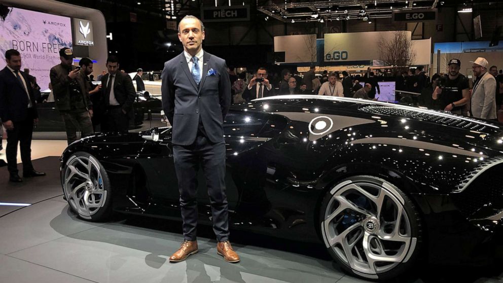 PHOTO: Etienne Salome stands next to his creation, the Bugatti "La Voiture Noire," the Black Car, at the Geneva Motor Show, March 5, 2019.