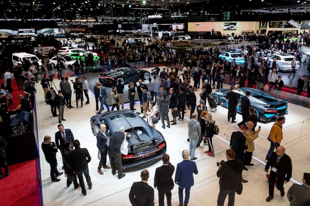 PHOTO: Bugatti cars are displayed on the floor of the Geneva Motor Show, March 5, 2019.