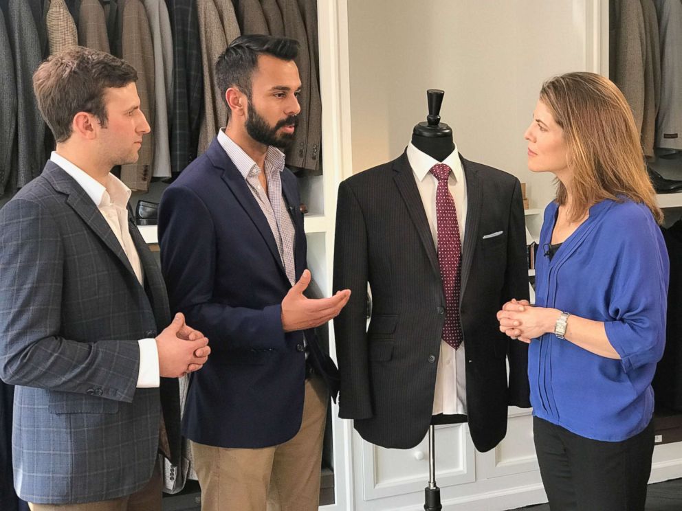 PHOTO: Aspetto Inc. CEO Abbas Haider and COO Robert Davis discuss their high end custom bulletproof suits.