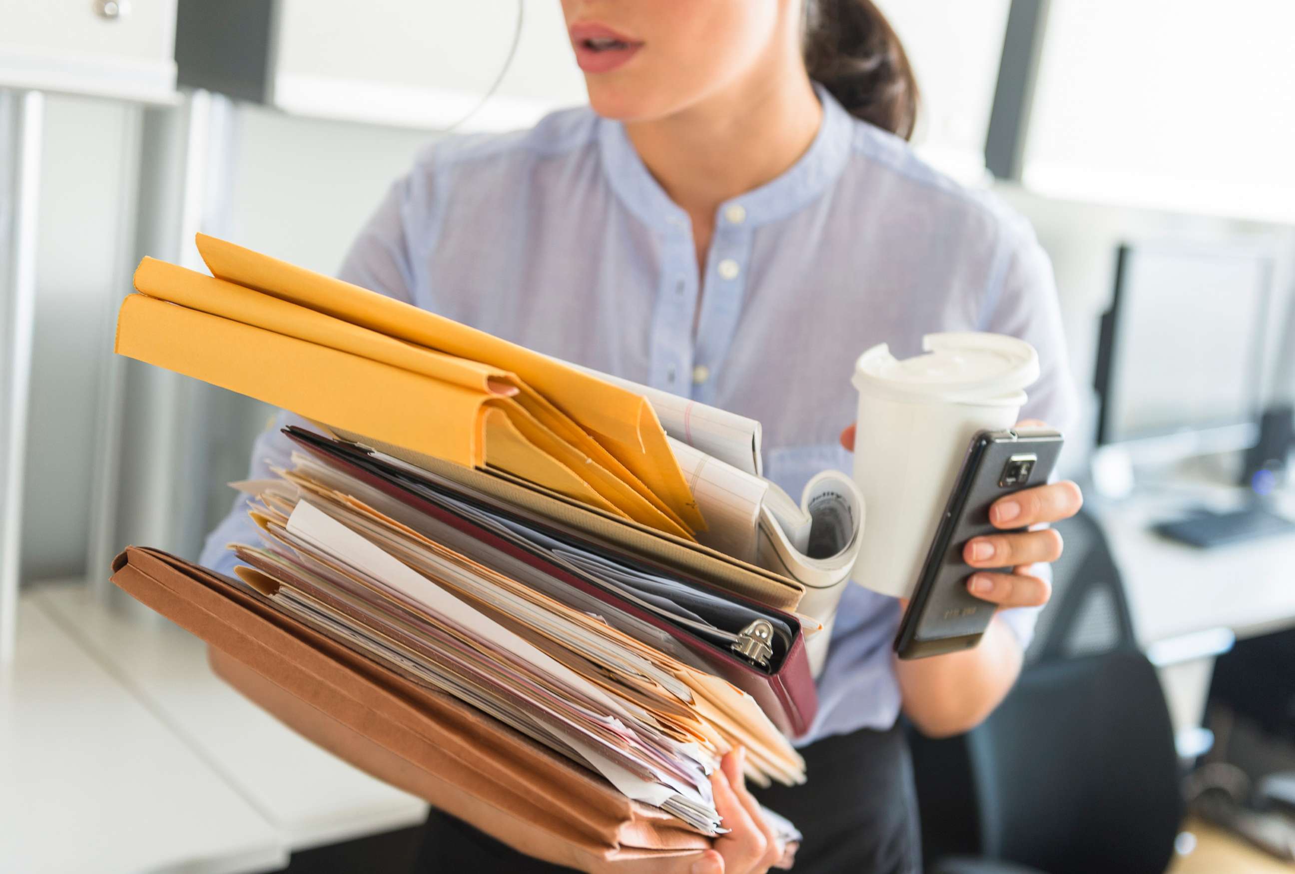 PHOTO: A woman is busy with work in a stock photo.