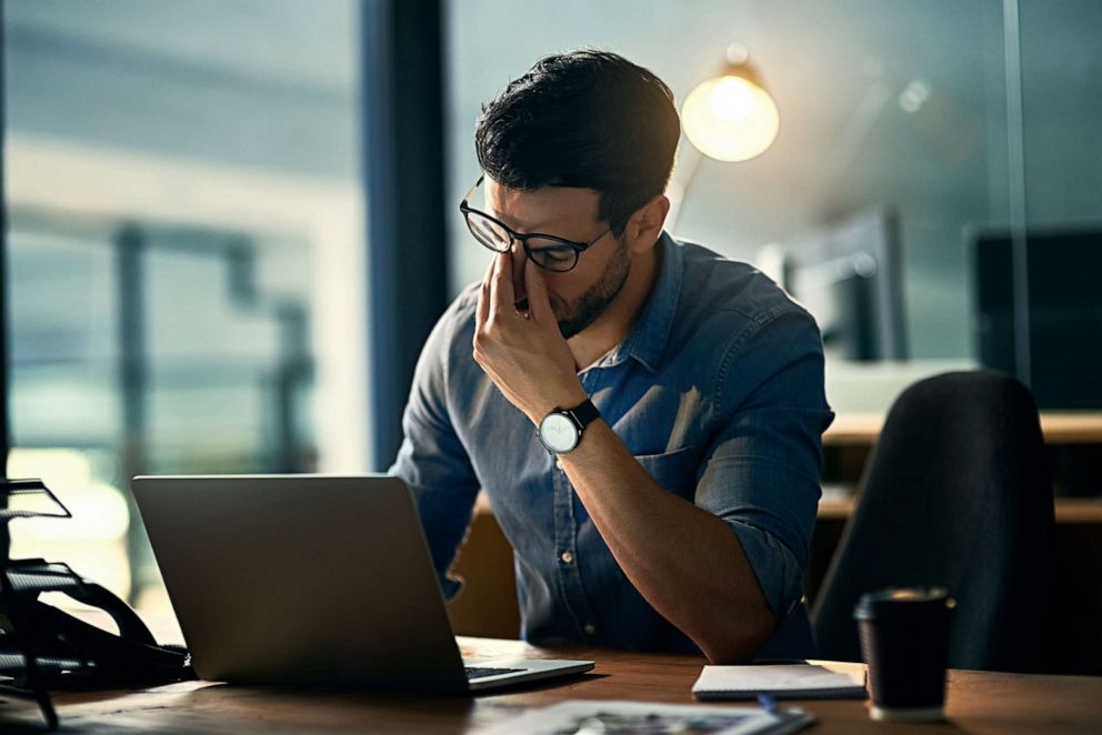 PHOTO: A man works in an office in a stock photo. 