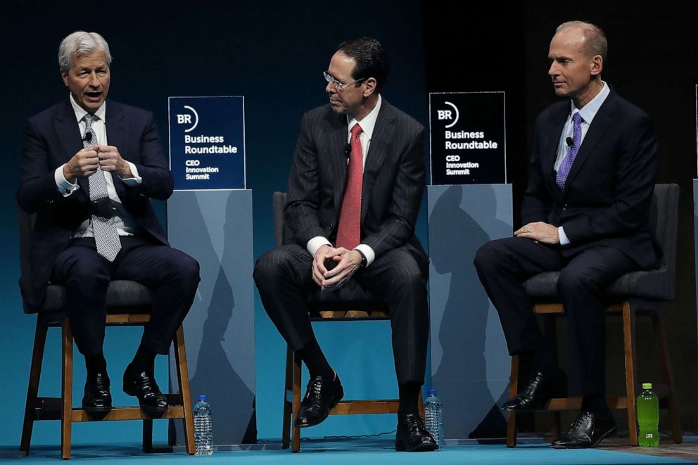 PHOTO: (L-R) Jamie Dimon, chairman and CEO of JPMorgan Chase, Randall Stephenson, chairman and CEO of AT&T Inc., and Dennis Muilenburg, chairman, president and CEO of the Boeing Company, participate in a business roundtable, Dec. 6, 2018, in Washington.