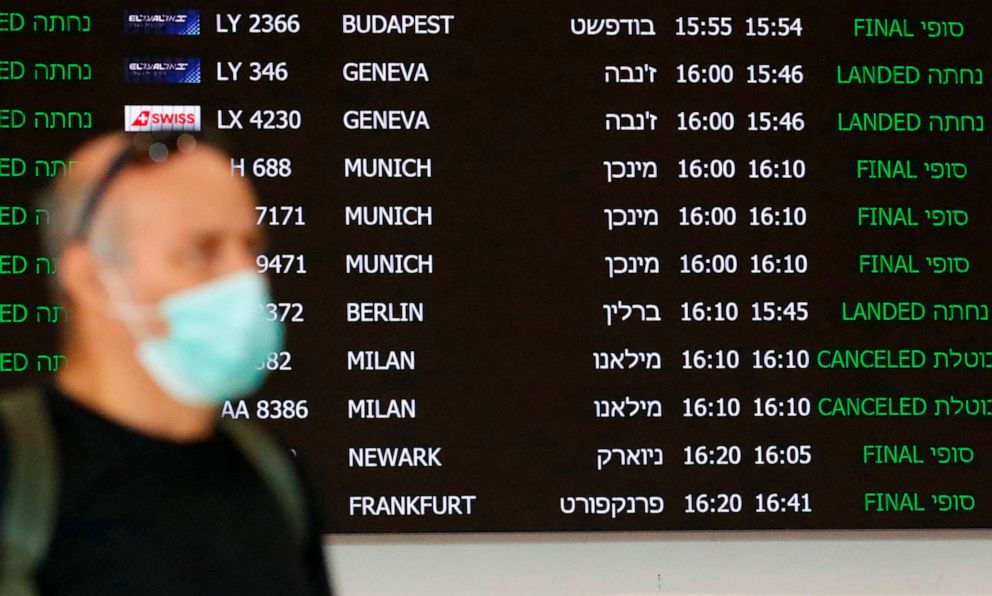 PHOTO: A flight information board displays cancelled incoming flights from Italy at Ben Gurion International Airport, near Tel Aviv, Israel, Feb. 27, 2020.