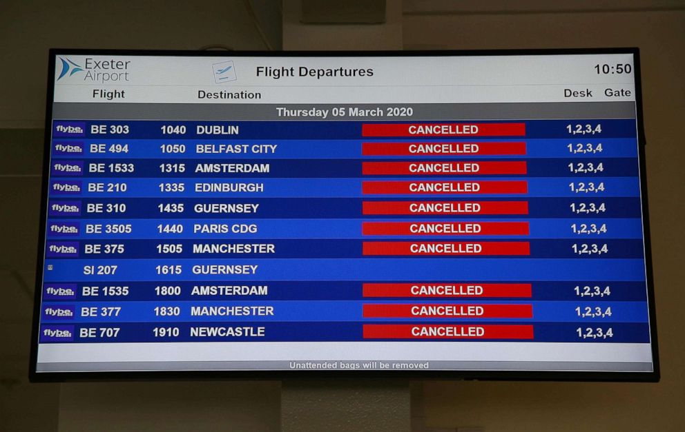 PHOTO: An electronic flight departure board displays 'cancelled' status's for all Flybe flights leaving Exeter Airport in Exeter, south-west England, March 5, 2020, following the news that the airline had collapsed into bankruptcy.