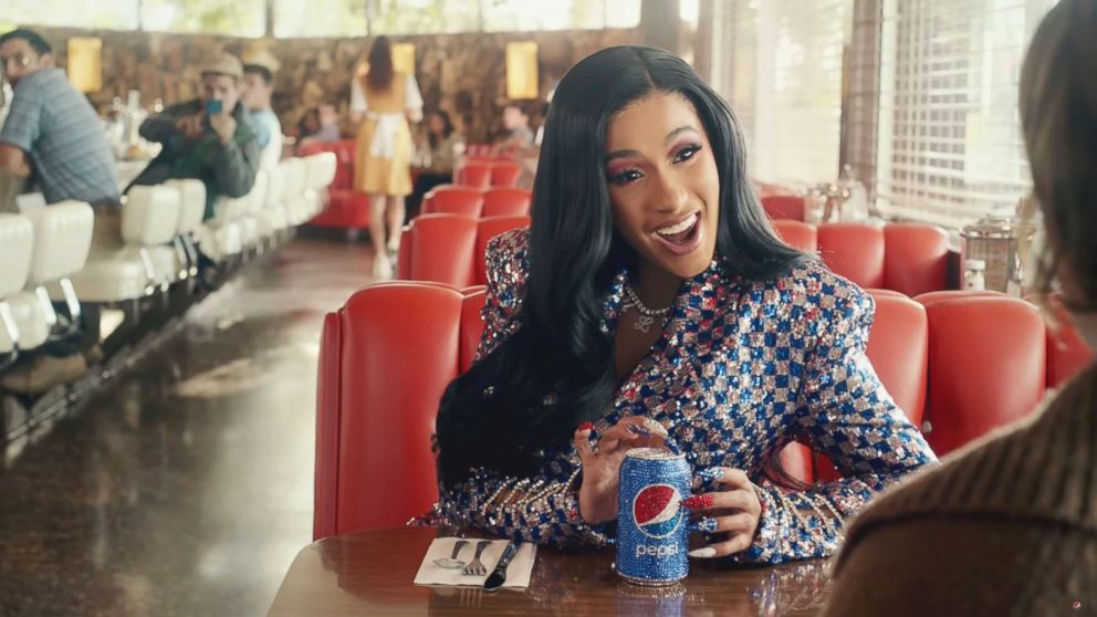 PHOTO: This screen grab from video provided by PepsiCo shows an image from the company's 2019 Super Bowl NFL football spot featuring Cardi B. Star power abounds in this year's Super Bowl ads. 