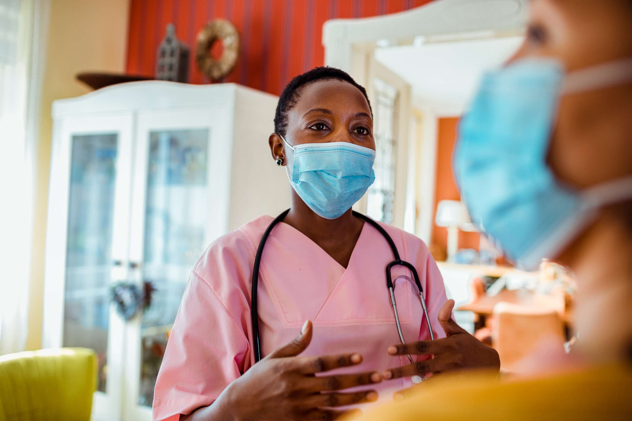 PHOTO: A woman speaks with a caregiver in this stock photo.