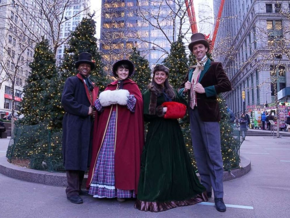 PHOTO: Erick Carter, Mallory Hawks, Natalie Storrs and Topher Lengerich perform carols as the The Original Dickens Carolers.