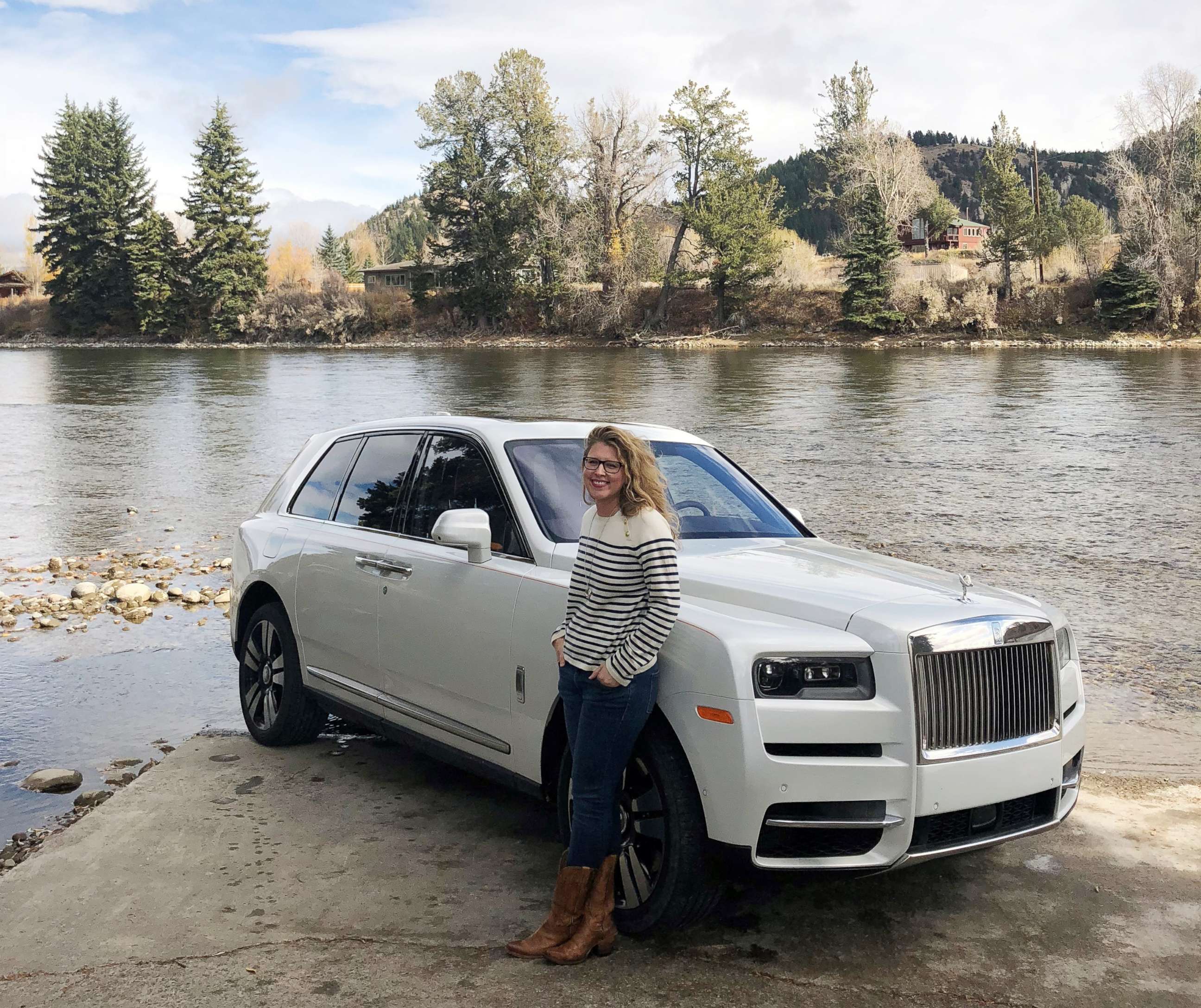 PHOTO: ABC News' Morgan Korn is pictured with a Rolls-Royce Cullinan SUV.