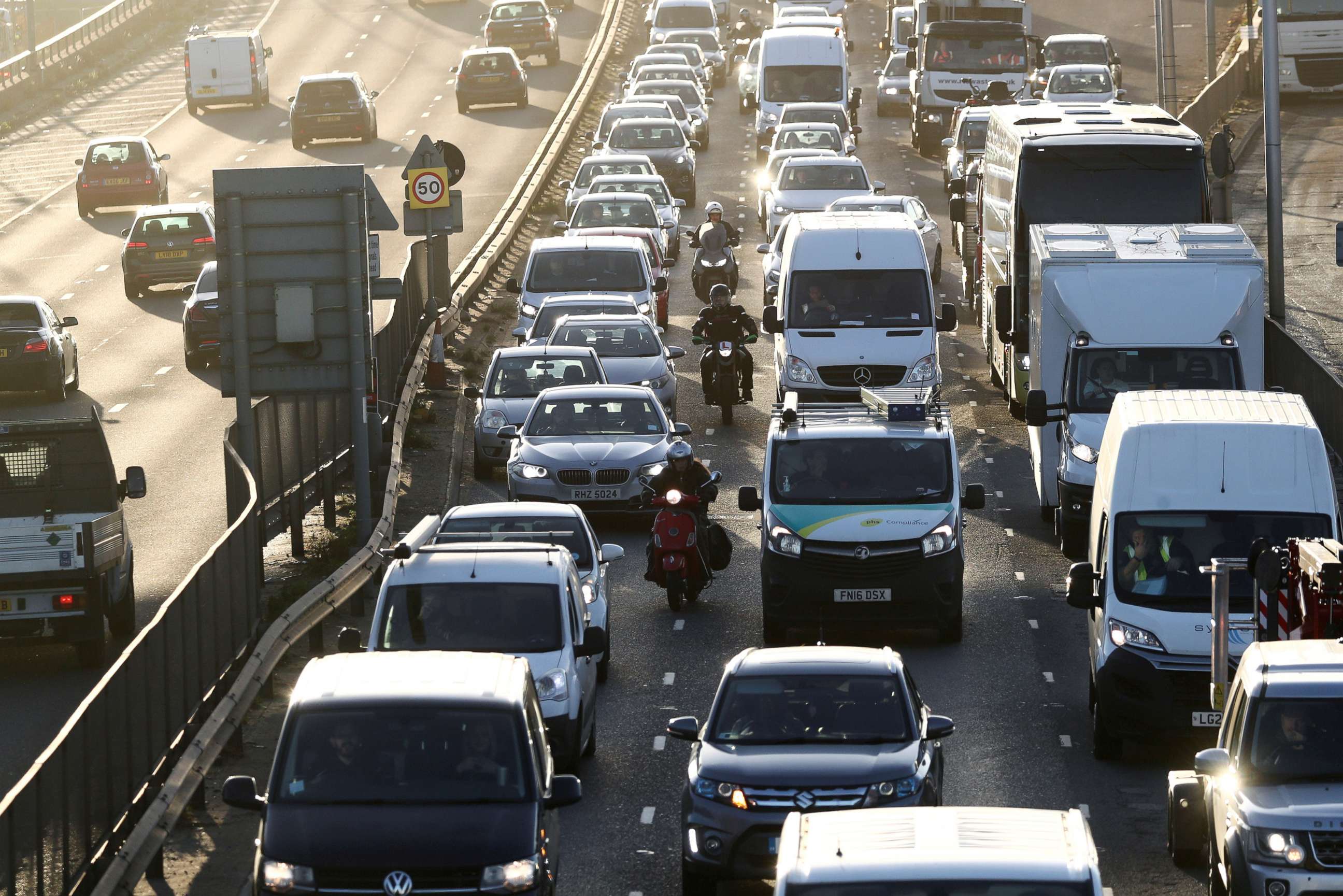 PHOTO: Vehicles sitting in traffic approach the Blackwall Tunnel, as Britain announced it will ban the sale of new petrol and diesel cars and vans from 2030, five years earlier than previously planned, in London, Nov. 18, 2020.