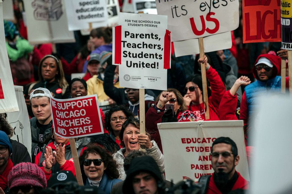 PHOTO: Chicago Public Schools teachers and supporters rally outside City Hall in Chicago on Friday, Oct. 18, 2019.