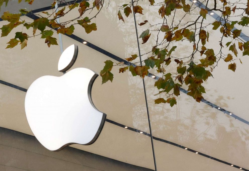 PHOTO: The Apple Inc logo is seen at the entrance to the Apple store in Brussels on November 28, 2022.