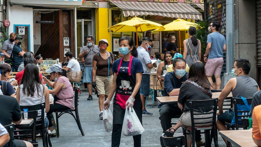 PHOTO: People dine outside in Chinatown in New York on August 15, 2020. 