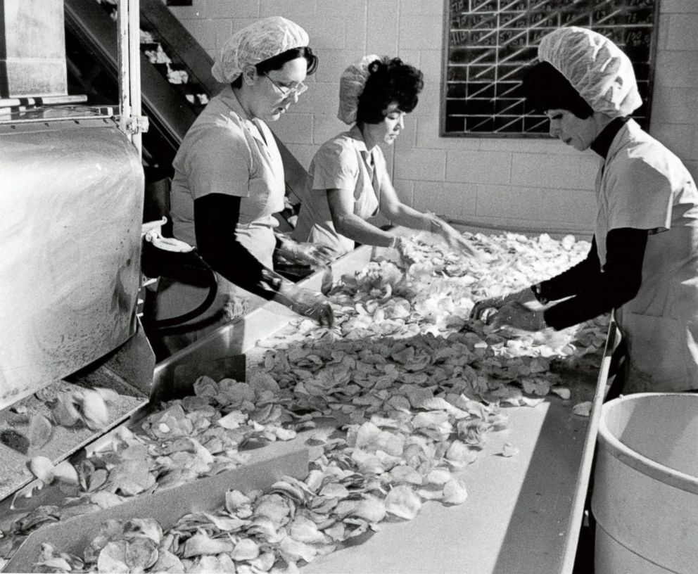 PHOTO: 1965 FIRST BBQ CHIP: Workers inspected the chips, which went for 10 cents a piece, before bagging them up. 