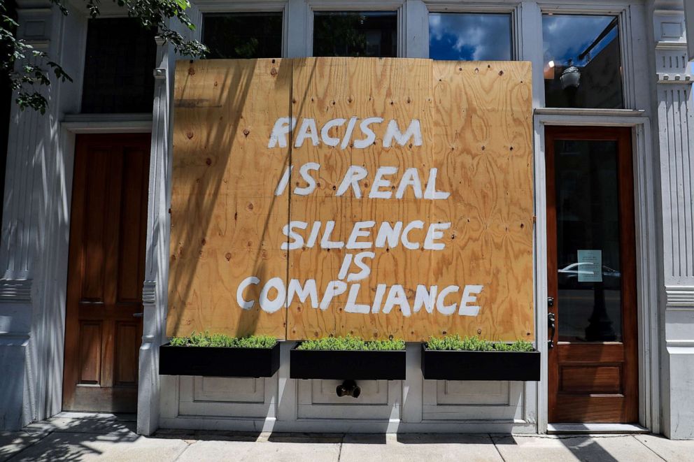 PHOTO: A mural on the covering of a window of a business is shown in downtown Cincinnati as they show support for the Black Lives Matter movement, June 6, 2020.