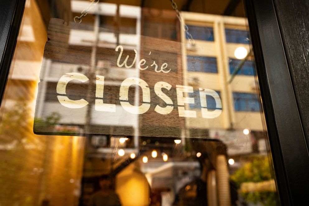 PHOTO: A closed sign hangs in business window in this undated stock image.