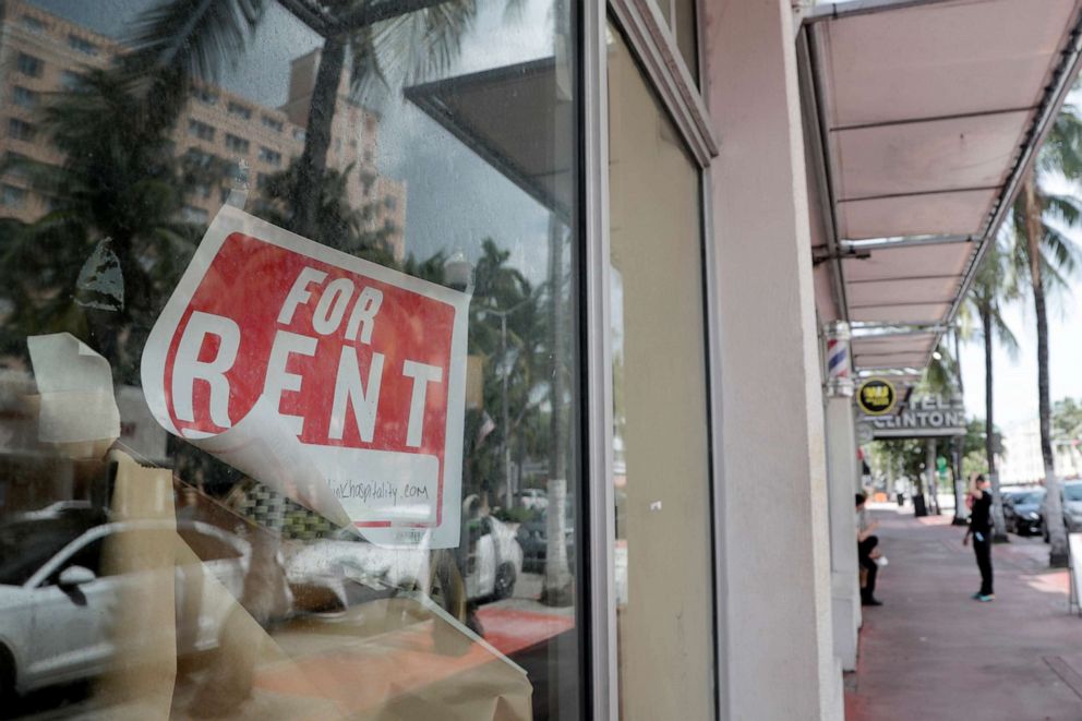 PHOTO: A "For Rent" sign hangs on a closed shop during the coronavirus pandemic in Miami Beach, Fla., July 13, 2020.