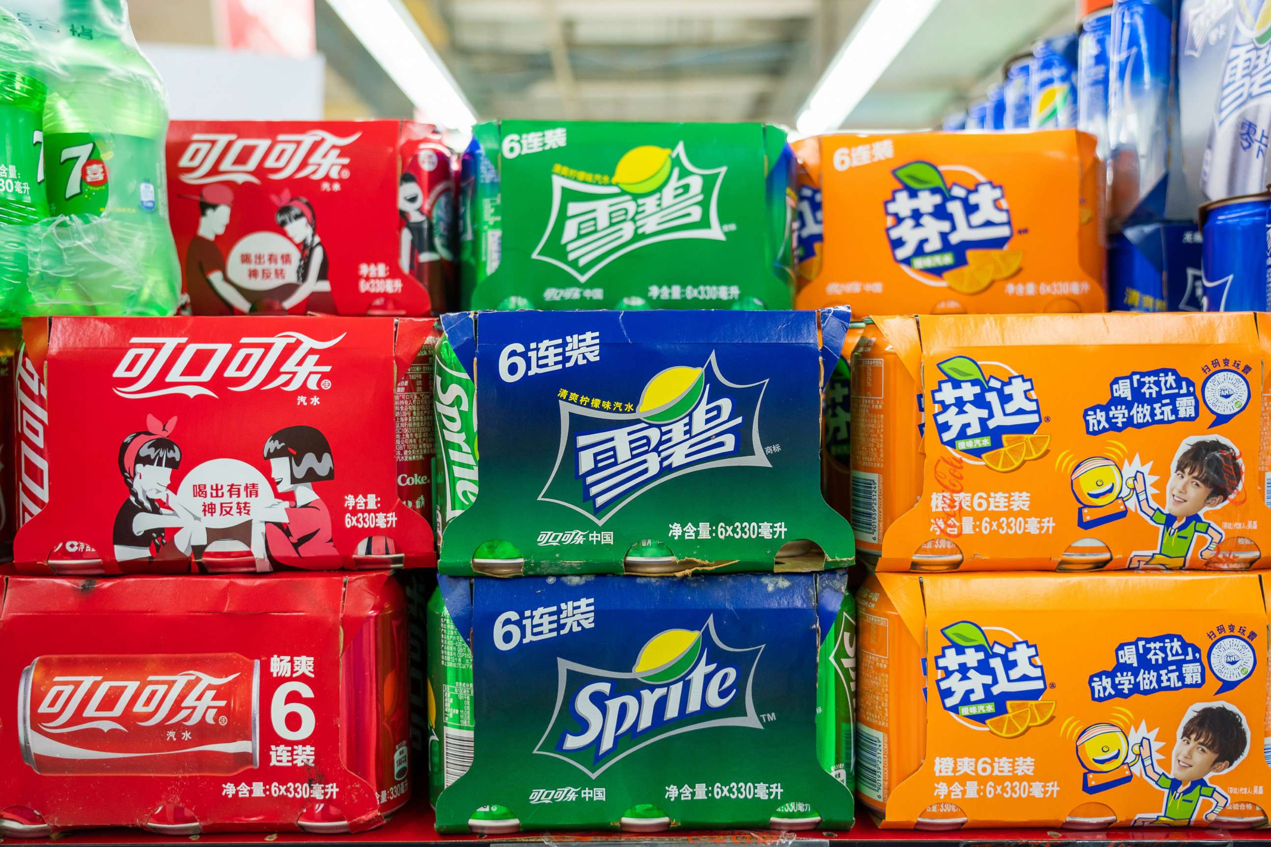 PHOTO: In this July, 27, 2019, file photo, cans of Coca-Cola, Sprite and Fanta, beverages produced by the Coca-Cola Company, are shown in a supermarket in Shanghai.