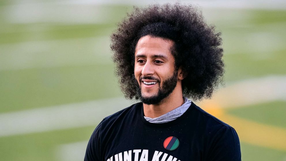 PHOTO: Colin Kaepernick looks on during his NFL workout held at Charles R Drew high school, Nov. 16, 2019, in Riverdale, Georgia.