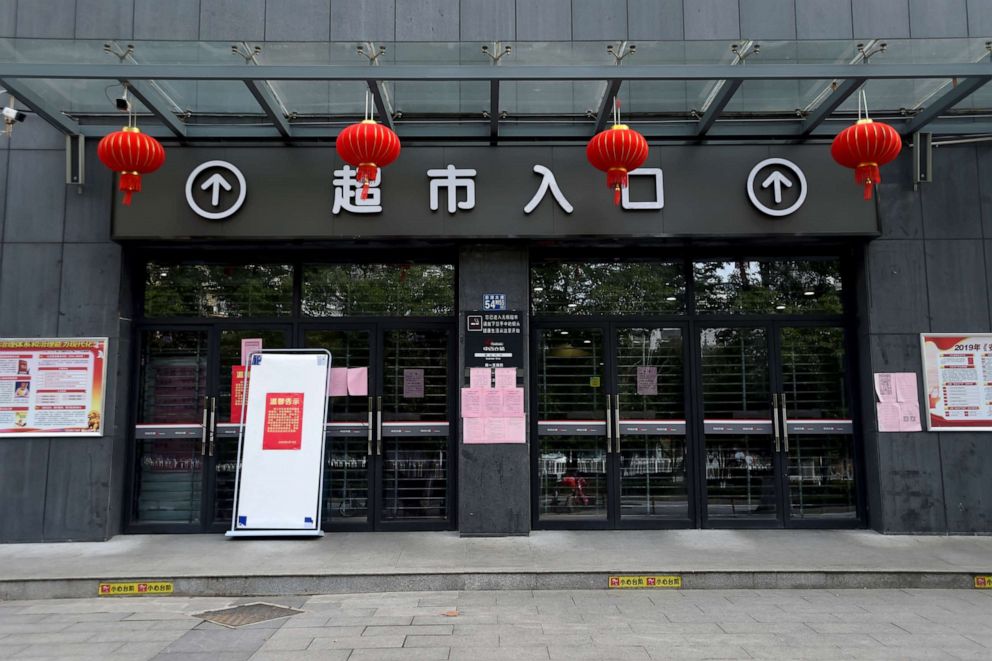 PHOTO: A closed supermarket is seen after the local government's announcement for supermarkets to stop selling to individuals, in Wuhan, the epicentre of the novel coronavirus outbreak, Hubei, China, Feb. 23, 2020.