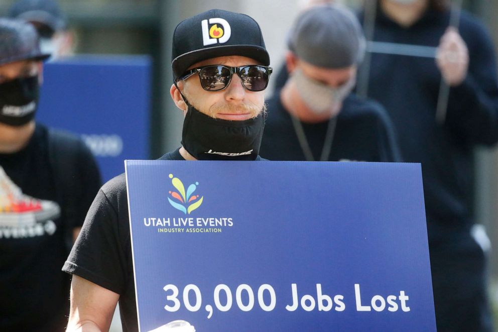 PHOTO: Special events workers who were forced out of work because of the COVID-19 pandemic marched Tuesday, July 21, 2020, in Salt Lake City.